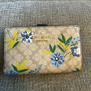 Kate Spade Beige Wallet with Blue and Yellow Floral Design